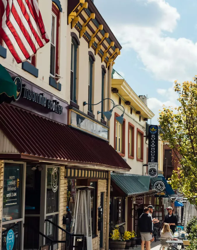 Street view of storefronts and restaurants along Fayette Street in Conshohocken.